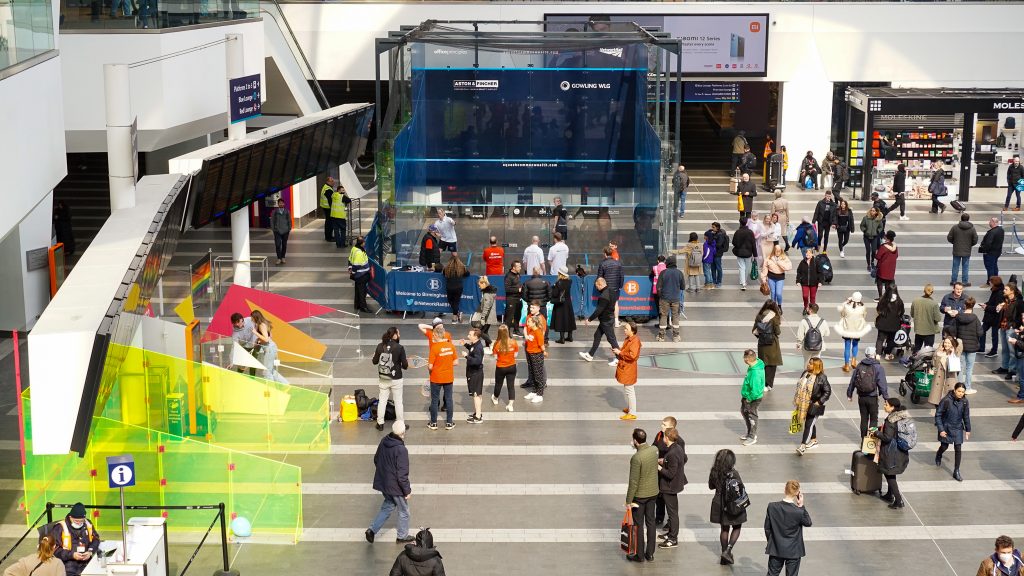 View of the glass squash court at New Street Station. 